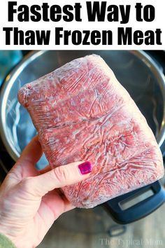 someone holding up a frozen meat in front of an instant pot with text overlay that reads, the fastest way to thaw frozen meat