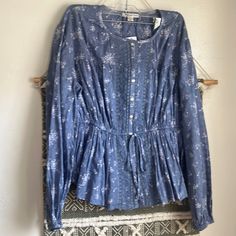 New American Eagle Blouse Size Small Originally $50 Blue Color With A See Through Fabric With Florals, Super Cute Great For The Season! Blue Tops For Spring Daywear, Blue Floral Print Tops For Daywear, Blue Long Sleeve Peasant Blouse, Blue Floral Print V-neck Blouse, Affordable Non-stretch Blue Blouse, Blue Non-stretch Long Sleeve Blouse, American Eagle Flannel Shirts, Babydoll Shirt, American Eagle T Shirts