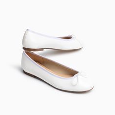 The classic, comfortable white patent ballerina silhouette is here to stay a staple in your closet forever. With workable bow detailing, this basic yet elegant flat will be your next go to. Extra soft patent upper Flexible leather sole Extra cushioned insole ½ inch heel Made in Spain Classic Patent Leather Ballet Flats For Work, Classic Patent Leather Flats With Round Toe, Classic White Ballet Flats For Formal Occasions, Classic White Ballet Flats For Formal Events, White Ballerina Flats, Ballerina Silhouette, Elegant Flats, Designer Flats, 2 Inch Heels