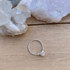 💓Wire Wrapped Rose Quartz Crystal Ring - 1 Ring💓 *these beads are a little more pink than the photo captures, it was hard to capture in this lighting This ring features a natural (not dyed) tiny 4mm rose quartz crystal bead, wrapped in your choice of wire. The options are silver plated, copper, bronze, black, or gold colored wire. All except the silver plated have a non tarnish coating so they will never oxidize or change color. Being careful to not wear your rings while showering or washing y Minimalist Pink Crystal Ring As Gift, Pink Stackable Crystal Promise Ring, Minimalist Pink Gemstone Stackable Rings, Dainty Pink Crystal Ring, Delicate Pink Stackable Rings For Gifts, Rose Quartz Crystal Promise Ring, Adjustable Pink Crystal Birthstone Ring, Rose Quartz Crystal Ring For Promise, Promise Ring With Rose Quartz And Gemstone Detail