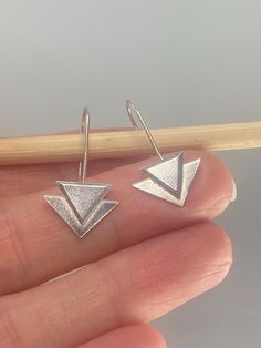 These geometric art deco inspired threader earrings have been handmade from recycled sterling silver and are really easy to wear - simply pull through and you're done! Measuring approximately 30mm full drop length by 15mm across, they are very lighweight and make a fabulous and unique gift. Adjustable Geometric Minimalist Earrings, Adjustable Minimalist Geometric Earrings, Modern Sterling Silver Threader Earrings, Modern Adjustable Sterling Silver Threader Earrings, Modern Silver Threader Earrings, Modern Silver Drop Threader Earrings, Everyday Geometric Sterling Silver Earrings, Modern Sterling Silver Nickel-free Threader Earrings, Modern Nickel-free Sterling Silver Threader Earrings