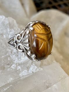 Art Deco Egyptian Revival Carved Tigers Eye Scarab Sterling Silver Vintage Ring ring size 6 Symbolic Carved Round Ring, Symbolic Carved Ring, Artisan Carved Rings, Spiritual Carved Round Ring, Brown Hallmarked Rings, Antique Handmade Oval Rings, Brown Carved Round Jewelry, Unique Carved Round Rings, Round Brown Carved Jewelry