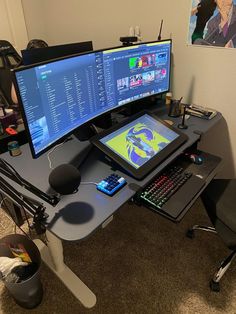 a computer desk with two monitors, keyboard and mouse