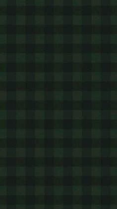 a black and green checkered background with small squares