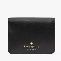 Kate Spade Madison Small Bifold Wallet Black Nwt Authentic Measurements 4.48" W X 3.8" H Features Metal Pinmount Logo Closure Type: Flap With Magnetic Snap Closure, Flap With Mag Snap Closure Dust Bag Included: No Exterior: Back Slip Pocket Materials Saffiano Leather Lining: Two Way Script Logo Lining Imported Style Number Kc581 Ksny Editor's Notes Don't Let The Size Deceive You: Our Small Wallets Have Room For All Your Credit Cards And Cash. Plus, You Can Fit It In Your Tiny Bag. Classic Kate Spade Wallet With Interior Card Slots, Black Card Holder With Interior Slots, Classic Kate Spade Wallet With Card Slots, Classic Rectangular Kate Spade Wallet, Elegant Black Compact Trifold Wallet, Classic Formal Kate Spade Wallet, Kate Spade Compact Coin Purse With Card Slots, Kate Spade Rfid Blocking Rectangular Wallet, Compact Kate Spade Coin Purse With Card Slots