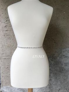 LISALI Skinny Wedding Dress Bridal Sash, Crystal Bridal Sash, Rhinestone Sash, Bridesmaid Belt, Wedding Dress Sash，Flower Belt This beatiful bridal sash is perfect for adding some bling to your dress! Made of - This beautiful sash is made with sparkly rhinestones details, very elegant. - The rhinestone portion is 16-34 inches long and about 0.4 inches wide. - satin ribbon - your color choice - the ribbon on the sash is a total of 100 inches long and it will fit sizes xs-xl. If you would like it Silver Fitted Bridal Belt, Fitted Silver Bridal Belt For Bride, Silver Fitted Bridal Belt For Bridesmaid, Fitted Silver Bridal Belt For Bridesmaid, Belt Wedding Dress, Bridesmaid Belt, Wedding Dress Sash, Flower Belt, Wedding Belt