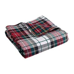 a plaid blanket folded on top of each other