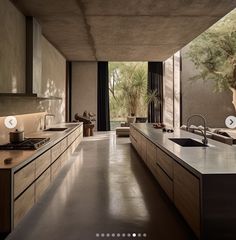 a large kitchen with an island counter top