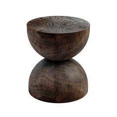 two wooden stools sitting on top of each other