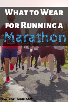 people running down a road with the words what to wear for running a marathon