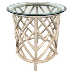 a round glass table with bamboo decoration