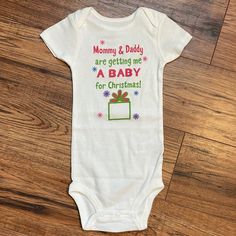 Custom Made Christmas Baby / Pregnancy Announcement Onesie / Bodysuit. Does Not Have Tags But Was Never Worn Just Used For Pictures. Size 18 Months. “Mommy & Daddy Are Getting Me A Baby For Christmas” I’ll Be Home For Christmas Baby Announcement, Christmas Pregnancy Shirts, White Long Sleeve Christmas Onesie, Pregnant Christmas Shirts Vinyl, My First Christmas Onesie, Baby Announcement Onesie, Christmas Baby Announcement, Pregnancy Announcement Onesie, Christmas Baby