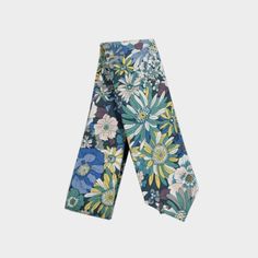 Our Seth Tie displays a mesmerizing blend of blue, yellow, white, and green floral patterns. A great tie for a summer night or a spring afternoon! Details: ➢ 100% Cotton ➢ 60.25” x 2.25” Summer Formal Ties With Floral Print, Summer Floral Print Tie, Summer Floral Print Ties, Multicolor Standard Tie For Summer, Summer Floral Print Standard Tie, Multicolor Summer Ties For Formal Occasions, Spring Floral Print Tie, Blue Spring Tie, Spring Afternoon