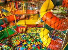 an indoor play area with lots of toys