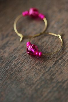 Lovely and unique boho earrings with bright hot pink glass seed beads, 8 mm bright pink glass beads and gold tone stainless steel round hoop earrings. Earring hooks are from nickel free and lead free metal. Perfect jewelry for everyday wear or a great gift for someone special! Diameter of hoops is 25 mm Other earrings of my shop you can see here: https://www.etsy.com/shop/NaTavelli?section_id=13757927  Thanks for visit. Pink Hoop Earrings With Dangling Beads For Gift, Pink Hoop Earrings With Colorful Beads, Pink Small Hoop Beaded Earrings As Gift, Pink Small Hoop Earrings With Dangling Beads, Small Hoop Pink Earrings With Colorful Beads, Pink Small Hoop Earrings With Colorful Beads, Festive Pink Jewelry With Ear Wire, Pink Hoop Earrings With Dangling Beads, Pink Wire Wrapped Beaded Earrings With Round Beads