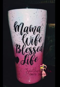 a pink and white cup with the words mama life is blessed life on it's side