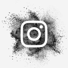 the instagram logo is splattered with black and white ink on a white background