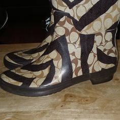 Coach Signature Print Rain Boots Size 7 In Great Condition Brown Round Toe Rain Boots For Fall, Brown Rain Boots With Round Toe For Fall, Casual Brown Coach Boots, Casual Coach Ankle Boots, Coach Ankle-high Casual Boots, Coach Casual Ankle-high Boots, Casual Coach Ankle-high Boots, Casual Ankle-high Coach Boots, Coach Shoes Women