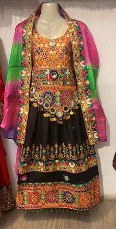 Our traditional Afghan/Pashtoon dress/frock is handmade by our talented artisans in Swat valley. Featuring beautiful Swati Hand embroidery and a fine quality crinkle fabric. These latest design frocks are currently very high in demand and commonly used as wedding dress , party wear, For Nikah and Mangni and Mehndi night events. The dress measurements are kept average. This Dress comes in three pieces 1: Qamees (Shirt) 2: Shalwar (Paint/Trouser) 3: Dupatta (Shawl) NOTE: We can happily create and design your custom orders. Show us a design and we won't disappoint you. Afghan Kuchi Dress, Eid Gifts For Her, Swat Valley, Mehndi Night, Afghan Dress, Embroidered Wedding Dress, Crinkle Fabric, Eid Gift, Afghan Dresses