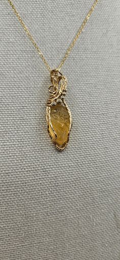 This gorgeous pendant is made with a stunning carved citrine wrapped in gold wire and accent gold beads. This listing is the pendant only. Available chains sold separately. Citrine Pendant, Gold Wire, Gold Beads, Gold Pendant, Pendant Necklaces, Citrine, Jewelry Inspiration, Jewelry Necklace Pendant, Etsy Accessories