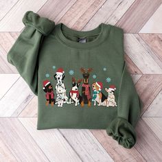 "Christmas Dogs Sweatshirt, Christmas Sweatshirt, Gift for Dog Lover, Holiday Sweater, Dog Mom Sweater, Cute Dog Hoodie How To Order 1️- Select the shirt size and color. 2️- Please Enter Design Color on to the Personalization Box. 3️- Choose your quantity as much as you want. 4️- After you added your note, please click \"Proceed to Check Out\" 5️- Finally, your order will be ready to ship 1-3 Business Day. * For multiple items go back to the listing and repeat the steps. Back Side Upgrade: https Winter Crew Neck Top With Dog Print, Winter Dog Print Crew Neck Top, Long Sleeve Winter Sweatshirt With Dog Print, Winter Long Sleeve Sweatshirt With Dog Print, Casual Dog Print Sweatshirt For Winter, Casual Winter Sweatshirt With Dog Print, Winter Cotton Sweatshirt With Dog Print, Dog Mom Sweater, Concealed Carry Handbags