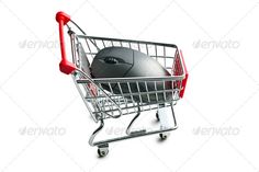 a computer mouse sitting in a shopping cart with a black ball on it's side