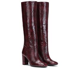 Meet Saint Emily, the new classic. Set the trend this season in these croco embossed vegan leather knee high boots from SaintG, these boots are sure to turn heads. Featuring knee high shaft, wide calf, a pointed toeline and covered block mid high heels. Full nude color genuine leather lined for a luxurious feel, cushioned leather insole provides lasting comfort. The slip on closure boot sit on a tunit sole. Brand Name - Saint G Upper - Croco Embossed Vegan Leather Lining - Full Leather Insole -