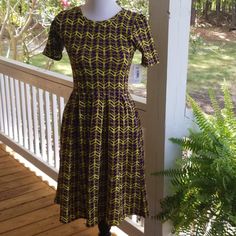 Lularoe Amelia Dress 3360 Chartreuse/Purple New W/Tags Yellow Short Sleeve Stretch Midi Dress, Yellow Stretch Short Sleeve Midi Dress, Fall Floral Dress, Short Sleeve Floral Dress, Retro Style Dress, Lularoe Nicole Dress, Lularoe Amelia Dress, Black Short Sleeve Dress, Amanda Dress