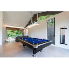 a pool table in the middle of a room