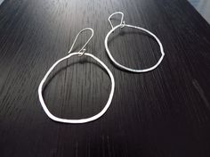 Organic silver hoop earrings hammered silver  by BLUEskyBLACKbird, $25.00 Simple Handmade Silver Hoop Earrings, Minimalist Hand Forged Circle Hoop Earrings, Modern Hand Forged Circle Hoop Earrings, Minimalist Hand Forged Dangle Hoop Earrings, Shaped Hoop Earrings, Dangle Earrings Silver, Sterling Silver Hoop Earrings, Everyday Earrings, Hammered Silver