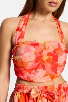 Elevate your summer style with the Ella Crop Halter Top in the Red & Pink Floral print. Versatile and chic, the removable halter strap means the top can be worn as a halter or strapless top. Features include side boning for light support and an adjustable tie-up back to accommodate differing bust sizes. Model is 173cm tall and wears a size 8.Fits true to size. - 100% Ramie- 100% Cotton Lining- Removable halter strap- Self-tie back closure- Side seam boning- Fully lined Halter Strap, Pink Floral Print, Halter Crop Top, Tie Backs, Store Fronts, Halter Top, Summer Style, Pink Floral, Strapless Top