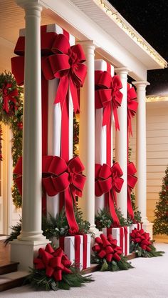 red and white christmas decorations with bows on columns