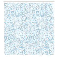 a shower curtain with blue and white flowers on it