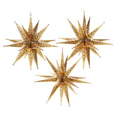 three golden stars hanging from the ceiling