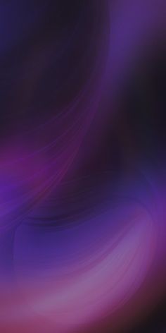 an abstract purple and black background with some blurry lines on the bottom right corner