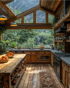 a kitchen with wooden floors and an open roof window that overlooks the forest outside