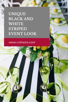 the table is set with green and white striped linens for an elegant dinner party