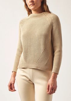 Daphne Sweater Beige Ribbed Knit Turtleneck, Spring Cozy Ribbed Turtleneck, Spring Funnel Neck Sweater With Ribbed Neckline, Spring Sweater With Funnel Neck And Ribbed Neckline, Spring Cotton Sweater With Funnel Neck, Spring Funnel Neck Cotton Sweater, Spring Ribbed Merino Wool Sweater, Beige Ribbed Merino Wool Sweater, Spring Textured Knit Sweater With Funnel Neck