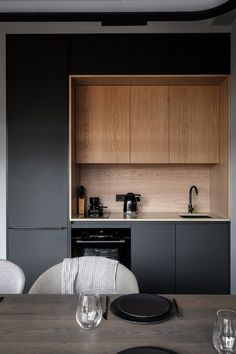 the kitchen is clean and ready to be used as a dining room or office space