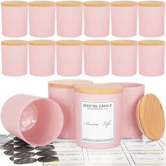 the pink candle is next to several stacks of coins and a wooden container with lid