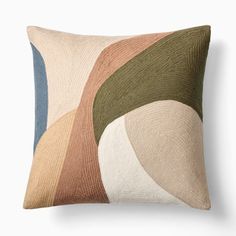 a multicolored pillow on a white background