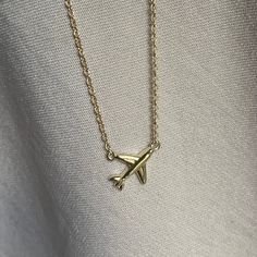 Our travel inspired Airplane necklace is the perfect addition to your Jewelry collection for any jetsetter. This delicate airplane pendant necklace is the perfect way to wear your passion for travel. Its dainty design is perfect for everyday wear and is sure to upgrade your style. This design features your choice of Fine Metal, made to match your unique taste and style. Wear alone for a minimalist look, or layer with other Jewelers Garden Necklaces to express your personal style. Available in St Airplane Pendant, Airplane Necklace, Travel Inspired, Chain Pendants, Cable Chain, Design Features, Jewelry Collection, Personal Style, Platinum