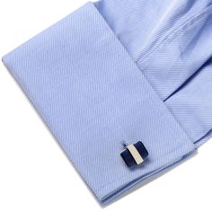 Keep it simple and elegant with the Silver Wrapped Navy Blue Catseye Cufflinks. The navy blue catseye is cut in a soft rectangle shape and wrapped in a silver metal band around the center. Cufflinks are silver plated base metal with bullet back closure. Classic Blue Cufflinks For Office, Classic Blue Jewelry For Business, Rectangular Cufflinks For Business, Classic Blue Cufflinks With Polished Finish, Modern Rectangular Cufflinks For Business, Modern Rectangular Cufflinks With Polished Finish, Modern Rectangular Polished Cufflinks, Onyx Cufflinks, Bar Studs