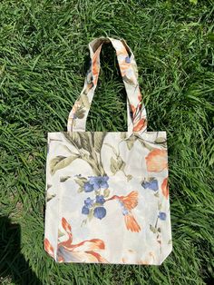 "Teflon handbags‼ ️ Birds and flowers print on beige background. With big pocket. Without zipper. Made of waterproof Turkish teflon fabric. Size: 37 x 34 cm - 14.6 x 13.4 inches Pocket : 25 x 32 cm - 10 x 12.6 inches Ready to ship One of a kind This is a fabric with Teflon impregnation. This gives it a number of advantages, among which the most important are: ❤️ Water repellent! A drop of liquid simply rolls over the surface of the tablecloth, protecting the table They are resistant to various t Eco-friendly Floral Canvas Bag For Everyday Use, Floral Print Bags For Everyday Summer Use, Summer Floral Print Bags For Everyday Use, Summer Floral Print Canvas Shoulder Bag, Floral Print Canvas Tote Bag For Daily Use, Floral Print Canvas Tote Bag For Everyday Use, Floral Print Tote Shoulder Bag For Everyday, Floral Print Tote Shoulder Bag, Everyday Floral Print Canvas Tote Bag