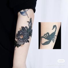 a woman's arm with a scorpion and flowers on it