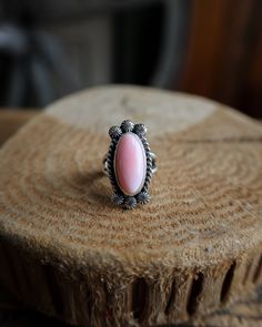 Pink Conch Slim Oval Ring- Size 7.5 Vintage Dome Ring With Polished Finish, Vintage Polished Dome Ring, Oval Opal Promise Ring, Sterling Silver Ring With Large Oval Stone, Vintage Oval Jewelry With Large Stone, Oval Sterling Silver Ring With Large Stone, Oval Sterling Silver Rings With Large Stone, Heirloom Style Oval Opal Ring, Handmade Oval Heirloom Jewelry