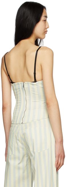 Cotton canvas corset-style tank top. Stripe pattern and boning throughout. · Zip closure at back · Curved hem · Integrated satin bra underlay with adjustable straps Supplier color: Deauville stripe Summer Tank Top With Removable Bra Pads, Striped Fitted Tank Top With Tank Straps, Fitted Camisole With Removable Bra Pads And Tank Straps, Fitted Camisole With Removable Straps For Summer, Fitted Summer Camisole With Removable Straps, Summer Straps With Built-in Bra And Fitted Style, Summer Cami Corset With Corset Back, Summer Cami Corset With Adjustable Straps, Summer Tank Top With Removable Straps