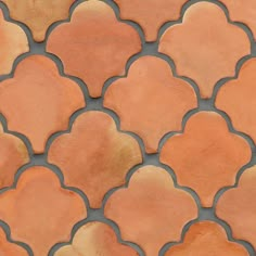 an orange and brown tile pattern is shown