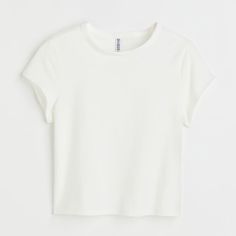 Cotton Jersey T-Shirt New With Tags, Never Worn Color: White Size: Xxl H&M Tops Size Guide Xxl Us 20-22 Chest Inch 46¾-51½ Waist Inch 41¼-46¼ Description & Fit: Crop T-Shirt In Soft Cotton Jersey With A Round, Narrow-Trimmed Neckline. Length: Short Sleeve Length: Short Sleeve Fit: Regular Fit Neckline: Round Neck Description: White, Solid-Color Pit 22” Length: Front 21”, Back 19.5" Composition: Cotton 95%, Spandex 5% Care Instructions: -Tumble Dry Medium -Only Non-Chlorine Bleach When Needed -Me Basic H&m Short Sleeve T-shirt, Basic Short Sleeve T-shirt By H&m, H&m Basic Short Sleeve T-shirt, Trendy White H&m Top, Trendy Relaxed Fit H&m Tops, Simple White Cropped T-shirt For Summer, Trendy H&m Tops Relaxed Fit, Trendy Relaxed Fit Tops From H&m, H&m White Relaxed Fit Tops