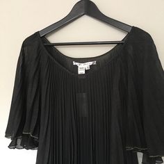 Fabulous And Flowy, This Max Studio Top Features A Sheer Crinkled Finish That Layers Perfectly Over Any Bottom. Scoop Neckline Ruffled At Chest And Sleeves 3/4 Batwing Sleeves Black Sheer Fabric With Hint Of Gold Gold Stitches On The Hem Elastic Waist This Blouse Runs Big New With Tag Retail: $88 Elegant Black Pleated Blouse, Spring Black Pleated Tops, Black Pleated Summer Tops, Black Pleated Tops For Spring, Black Pleated Tops For Summer, Black Pleated Blouse For Spring, Spring Pleated Blouse For Night Out, Spring Blouse With Pleats For Night Out, Pleated Blouse For Night Out In Spring